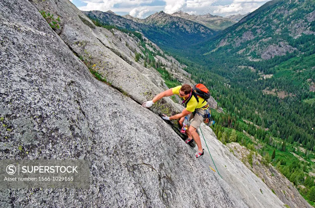 Rock climbing a route called the Regular Route which is rated 5,6 and located on Slick Rock near the city of McCall in the Salmon River Mountains of c...