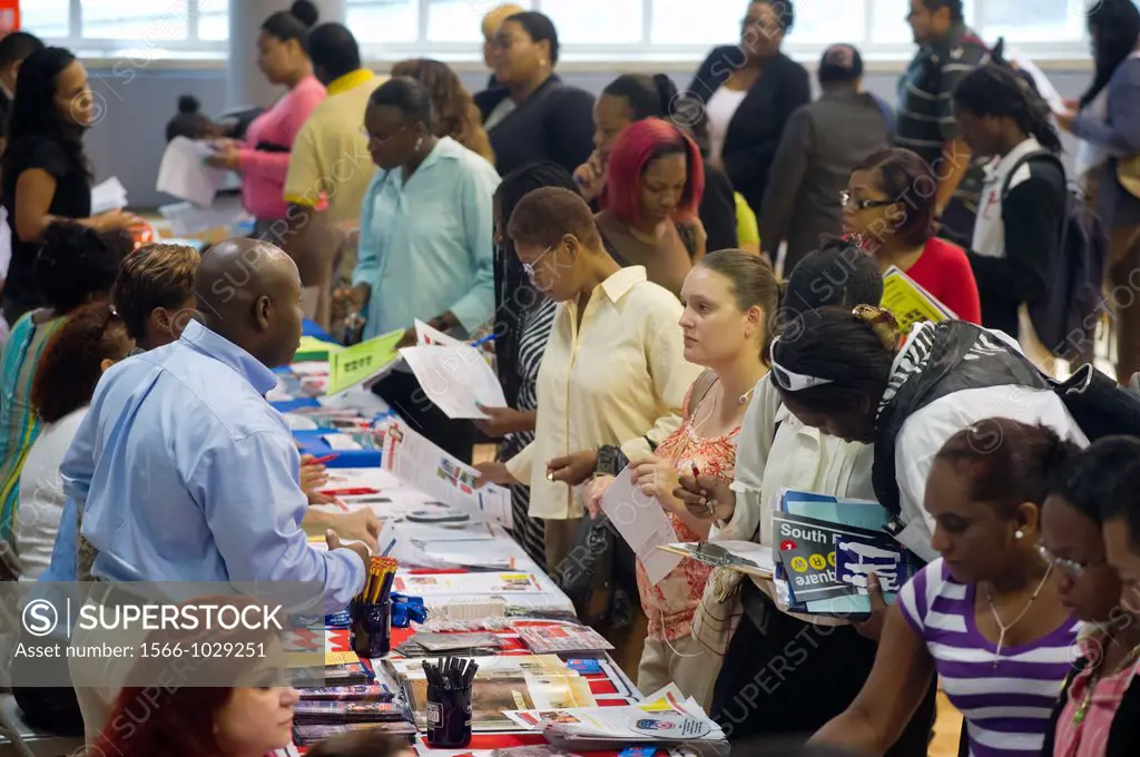 Job seekers attend a job fair in the East Harlem neighborhood of New York The job fair is one of the many events occurring during the Harlem Week fest...
