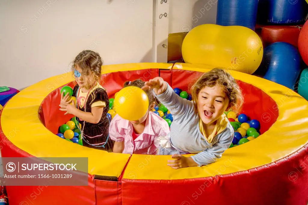 Partially blind girls toss plastic balls during an occupational skills class at the Blind Children´s Learning Center in Santa Ana, CA  The exercise im...