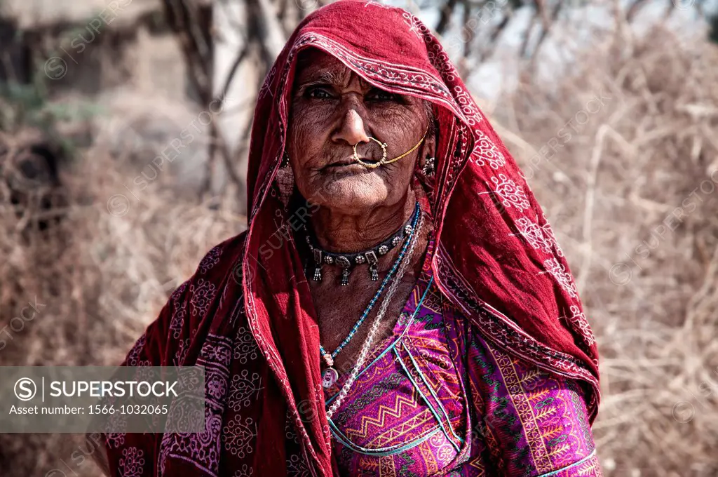 Portrait of a tribal woman in a small village around Jodhpur, Rajasthan, India