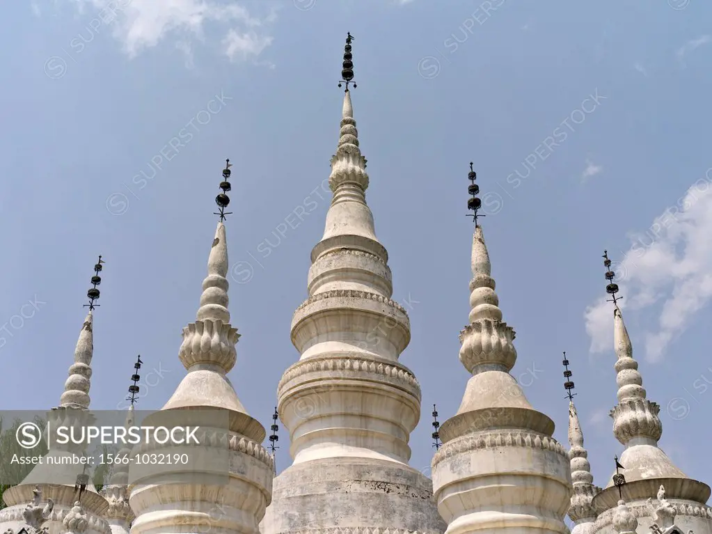 The ´mother-and-children pagodas´ are an architectural complex rarely seen in China  The best-known example is the Manfeilong White Pagodas at Damengl...