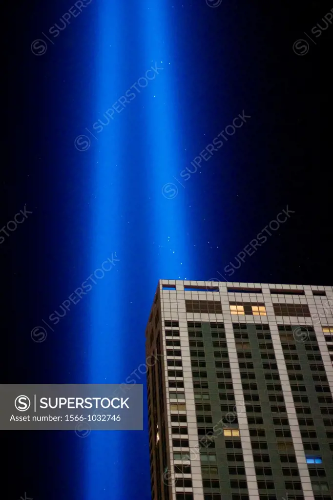 New York, NY - September 11, 2012: The twin columns of light of the installation ´Tribute in Light´ rise into the night sky over Manhattan in memory o...