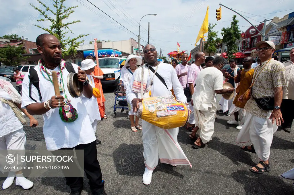 Hundreds of members of the Hare Krishna religion march in Richmond Hill in the New York borough of Queens during their annual Ratha Yatra parade The n...