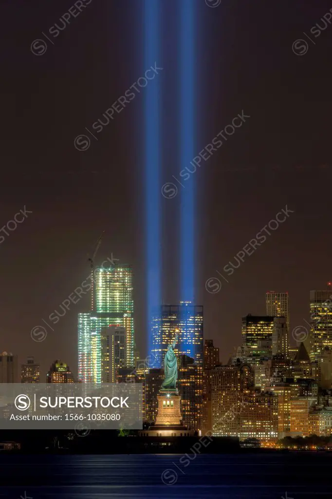 The twin beams of light of the Tribute in Light, an annual memorial to the events of September 11, 2001, shine into the evening sky in New York City o...