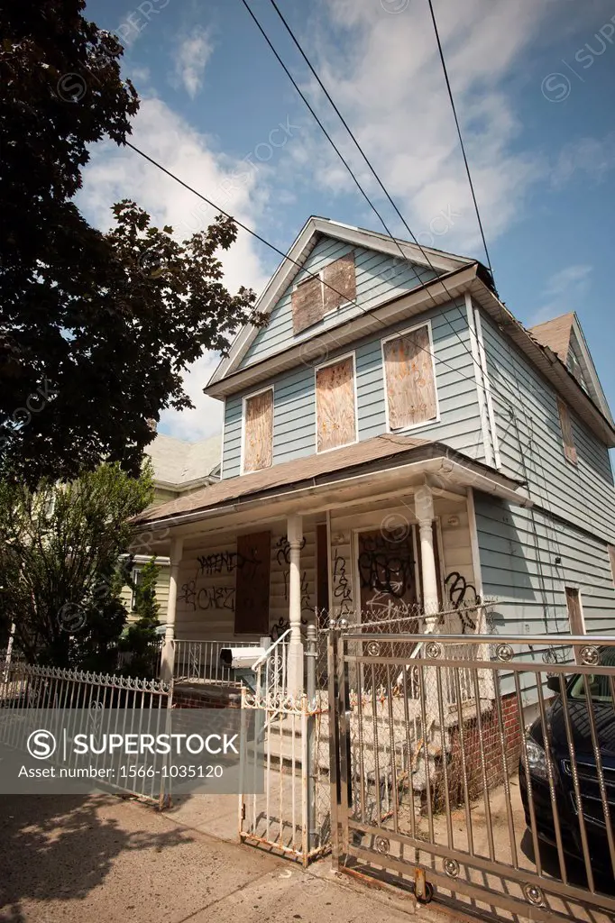 Dilapidated home for sale in the Richmond Hill neighborhood in the borough of Queens in New York