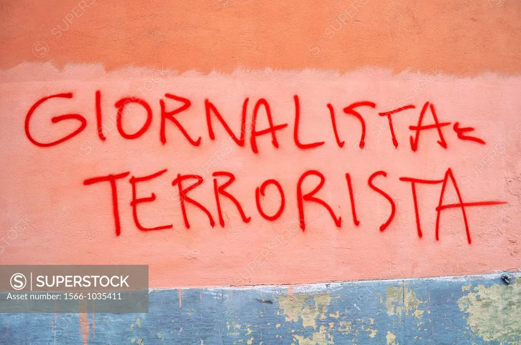 Bologna, Italy: graffiti in the city center Journalist = Terrorist’
