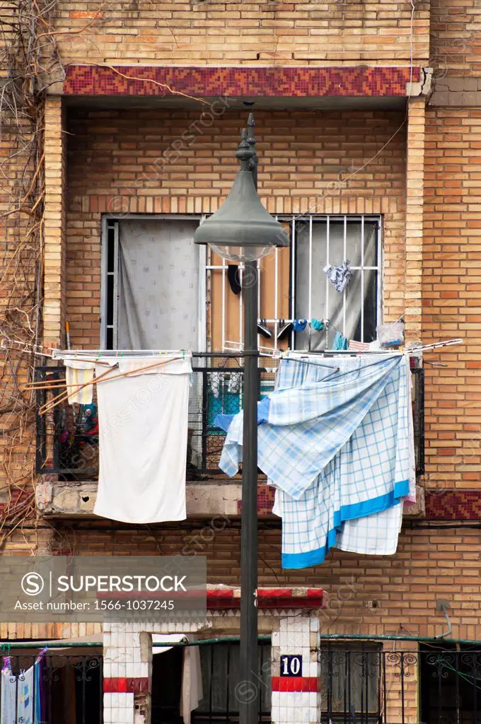 Hanging blankets in Nazaret district, Valencia, Spain