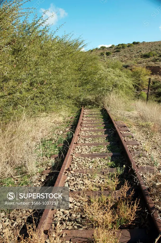 A section of old, Victorian railway line lies unused and abandoned in the South Africa Karoo