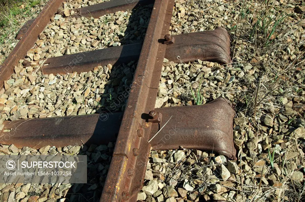 An historical piece of Victorian railway track, now abandoned, lies in disuse 