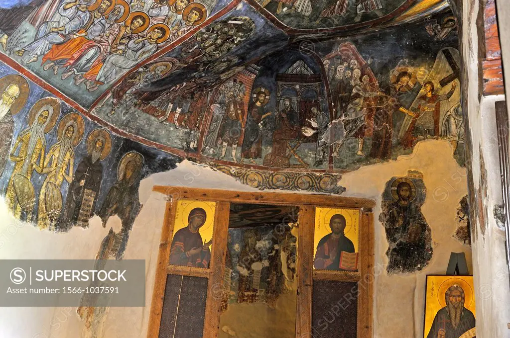 walls adorned with frescoes of the ermitage cave of the monk who founded 12th Century Agios Neophytos orthodox monastery, Paphos district, Cyprus, Eas...