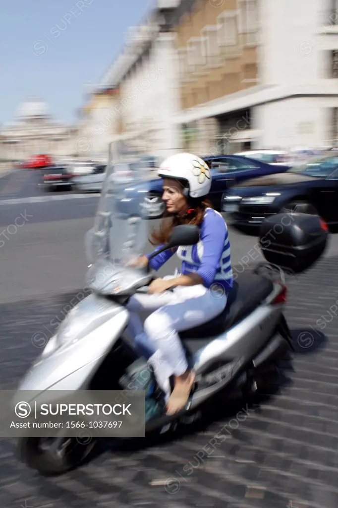 fast scooter by saint peter´s square in rome italy