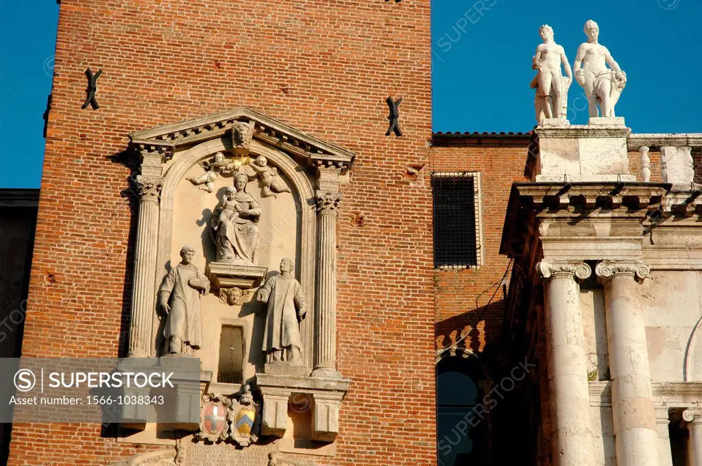 Vicenza, Italy: detail of Torre Bissara and Basilica Palladiana, in Piazza dei Signori  