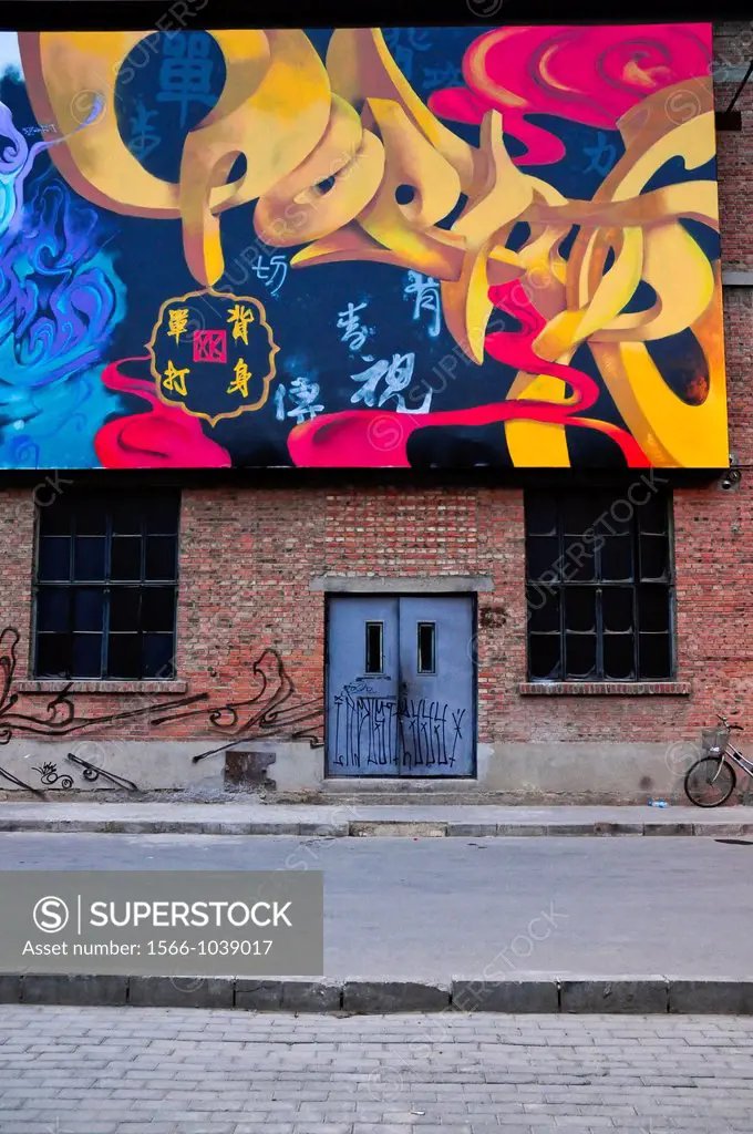 Graffiti mural at 798 Art Zone, a square kilometre of converted industrial site in Beijing´s northeastern Chaoyang District, Beijing, China, Asia.
