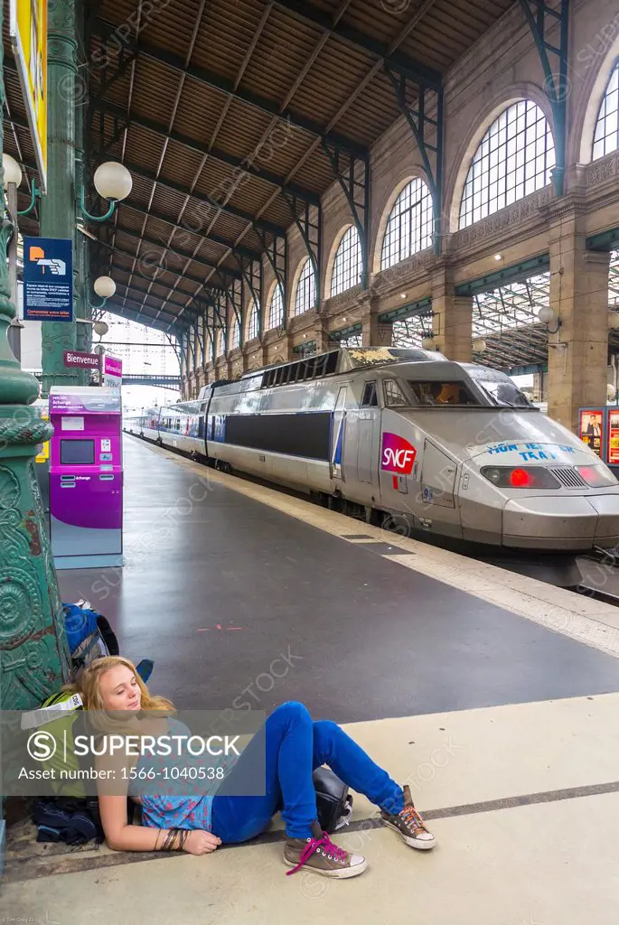 Paris, France, Tourist Girl with Back bag, Resting While Traveling in Train Station, Gare de Lyon,