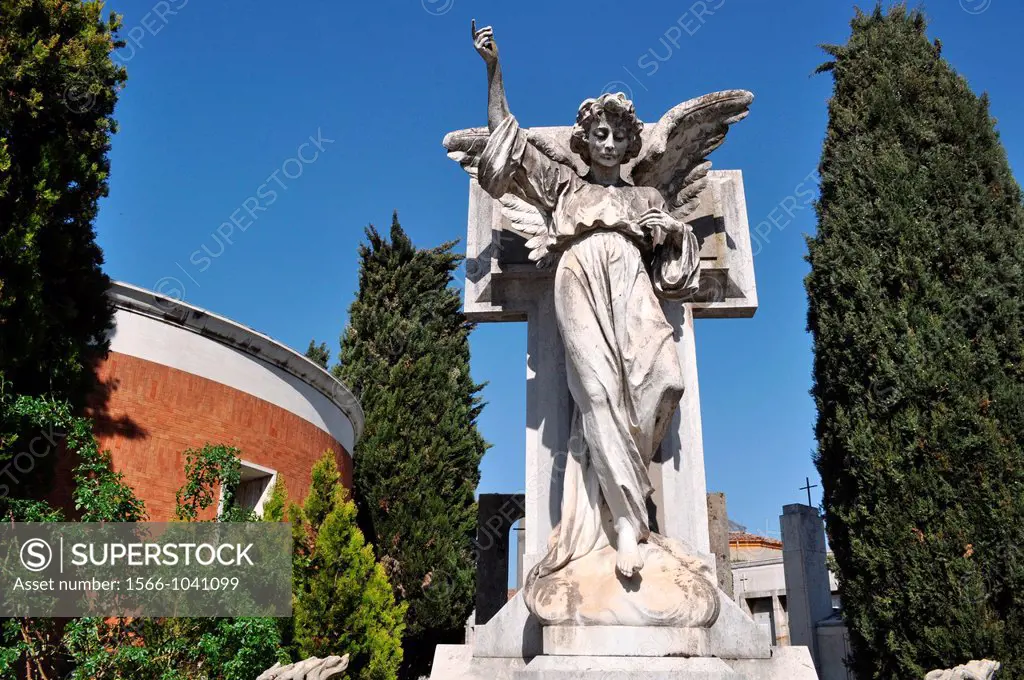 Bologna, Italy: angel statue on a grave at Cemetery of Certosa