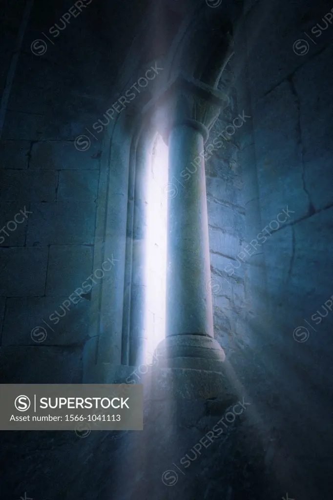 A mysterious view of Cong Abbey with ray of lights, Cong, County Mayo, Ireland, Europe