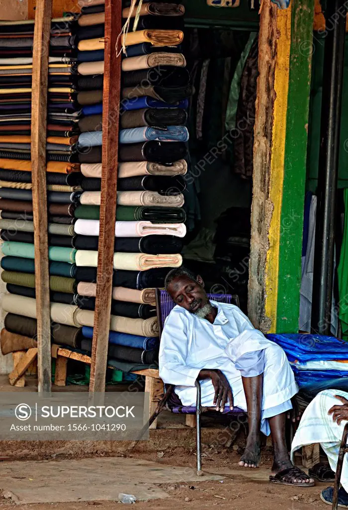 Tailor napping in his store´s doorway  Segou, Mali