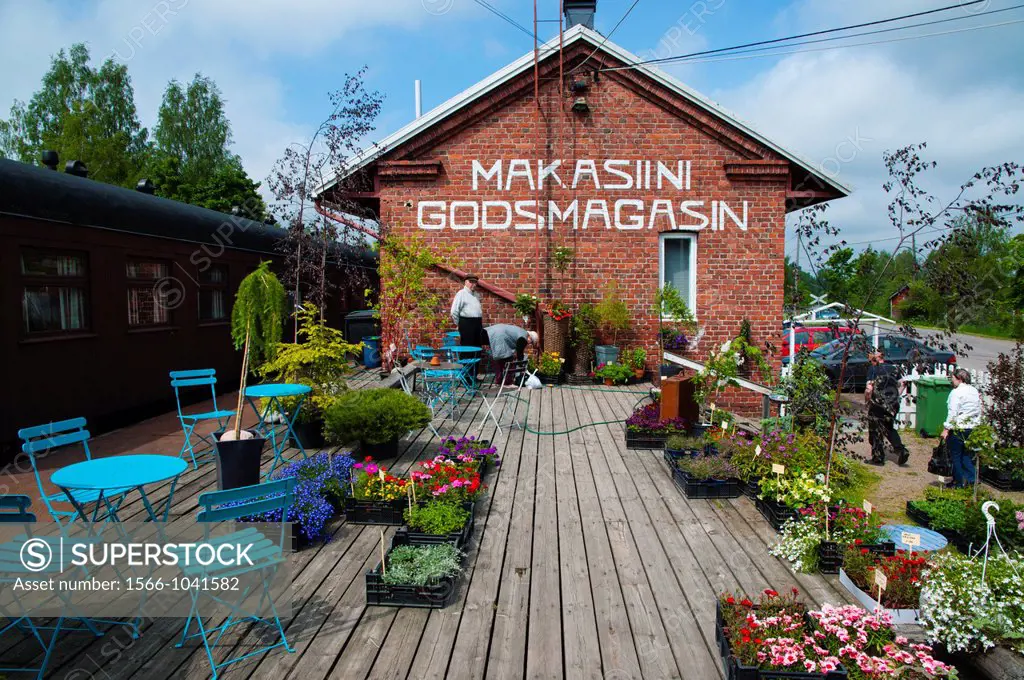 Cafe terrace and flower shop outside Makasiini shop and cafe Porvoo Uusimaa province Finland northern Europe