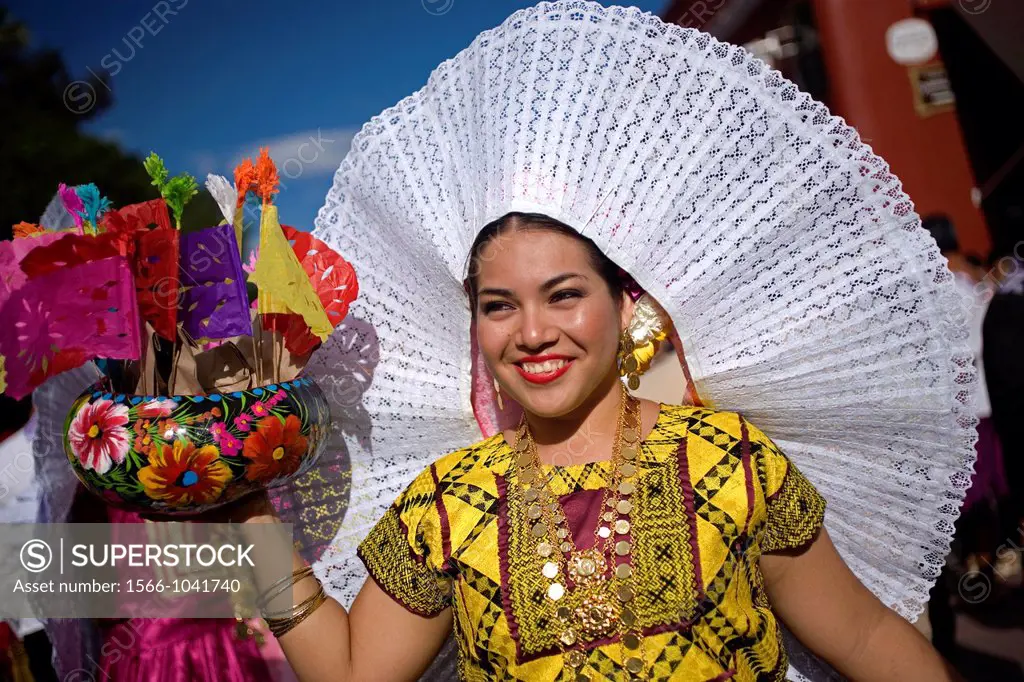 A Tehuana dancer smiles during the Guelaguetza parade in Oaxaca, Mexico, July 21, 2012  Oaxaca commemorates the ´Guelaguetza,´ an annual celebration b...