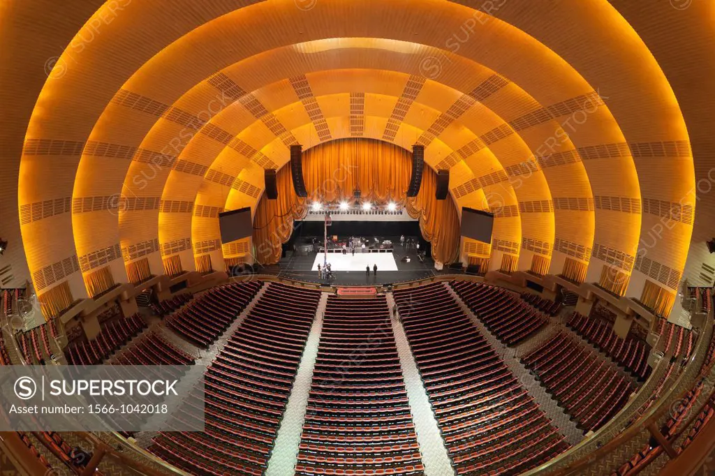 The view of the stage from the balcony as workers prepare for a show in historic Radio City Music Hall in New York City, New York, USA