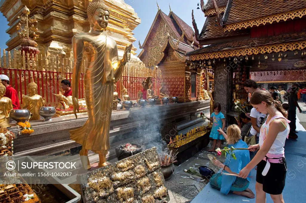Tourists at Prayer, Wat Prathat Doi Suthep , Chiang Mai , Thailand