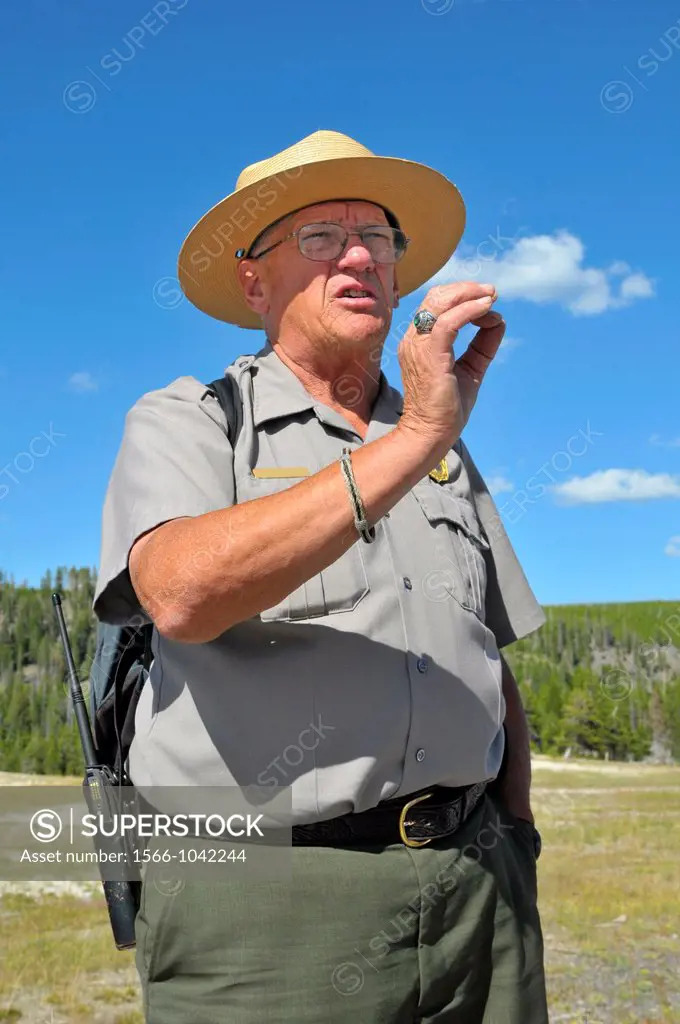 Park Ranger at Old Faithful Geyser Yellowstone National Park Wyoming WY United States