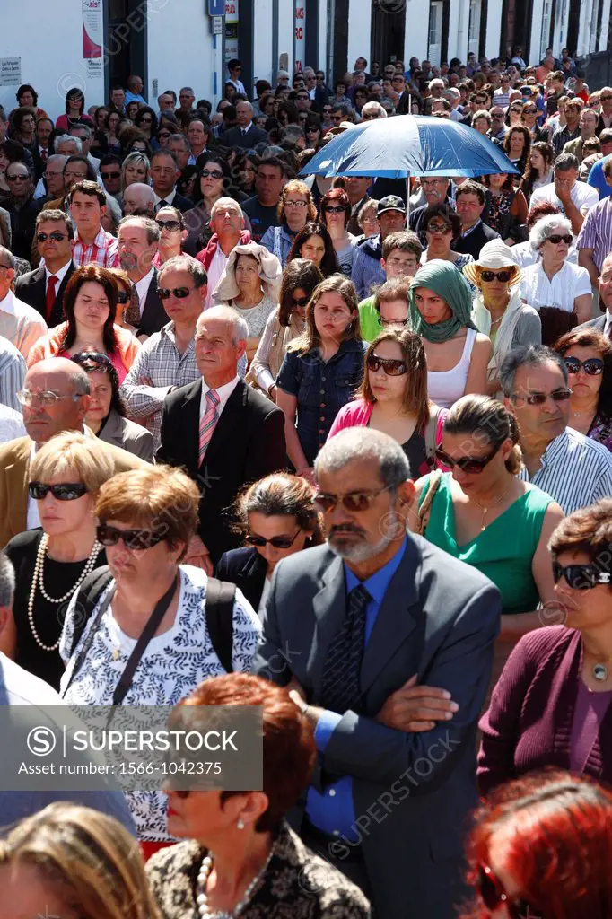 People attending catholic mass outdoors in Ponta Delgada, Azores islands, Portugal