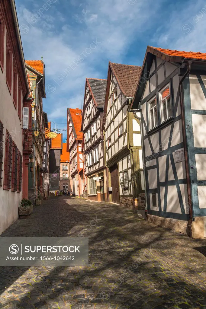 Small alley with traditional houses in Alsfeld on the German Fairy Tale Route, Hesse, Germany, Europe