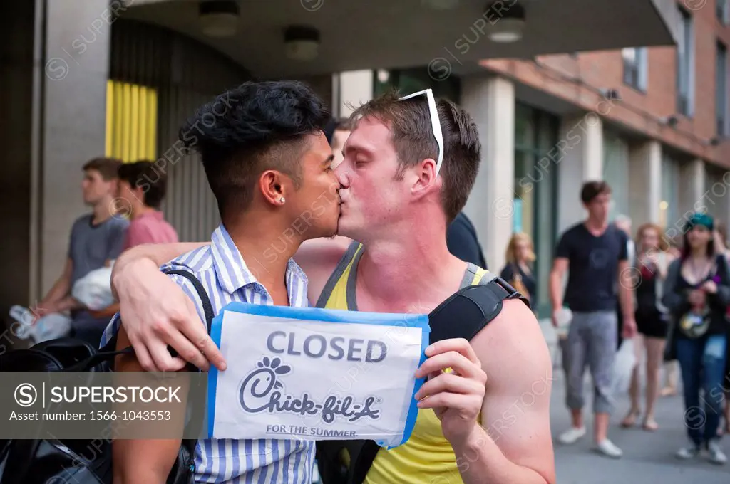 A kiss-in protesting Chick-Fil-A´s President Dan Cathy´s opposition to same sex marriage in Greenwich Village in New York in front of the NYU dormitor...