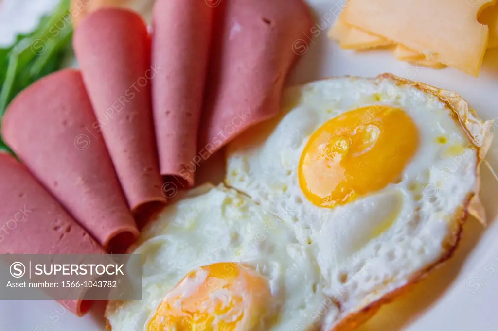Breakfast plate with Mortadella, eggs 