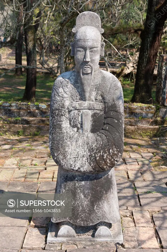 A stone statue of a man at the tomb of Emperor Tu Duc, near Hue, Vietnam