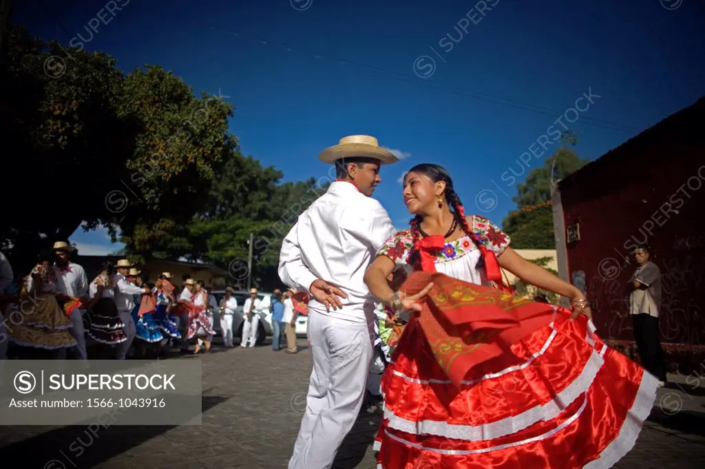 A young couple wearing traditional dresses dance during the Guelaguetza parade in Oaxaca, Mexico, July 21, 2012  Oaxaca commemorates the ´Guelaguetza,...