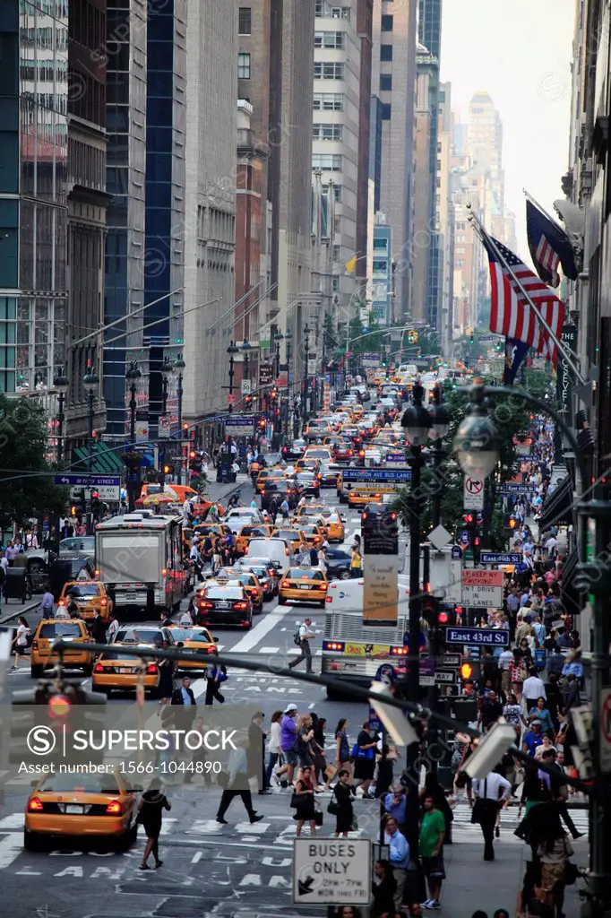 Sixth Avenue in midtown Manhattan during rush hour  New York City  USA.