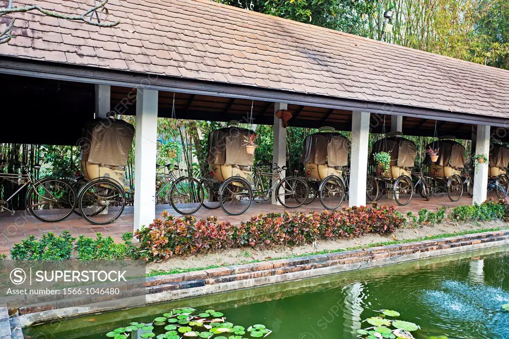 Rickshaws, The Legend hotel, Chiang Rai Province, Thailand.