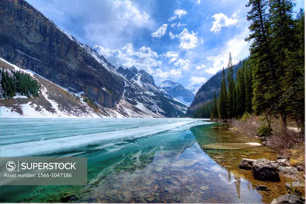 Lake Louise, Alberta, Canada, in the spring time Ice on lake melting