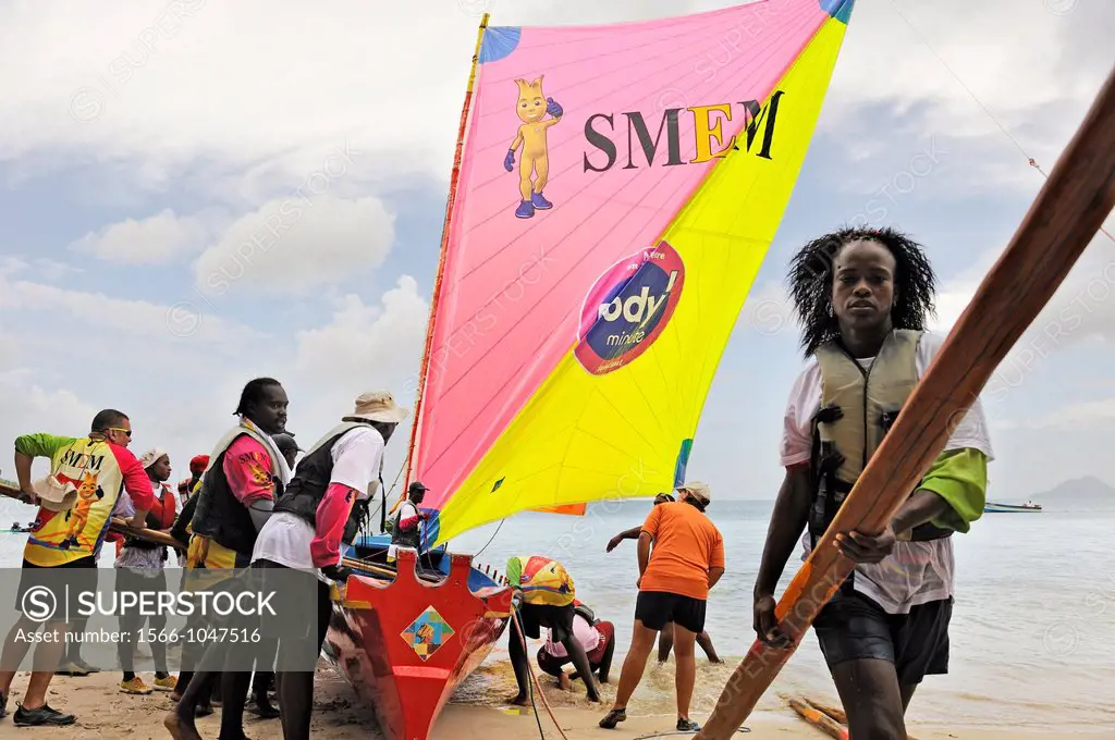 preparation of the skiff before the race during the Yoles Festival, Sainte-Anne Bay, Martinique, french island overseas region and department in the L...