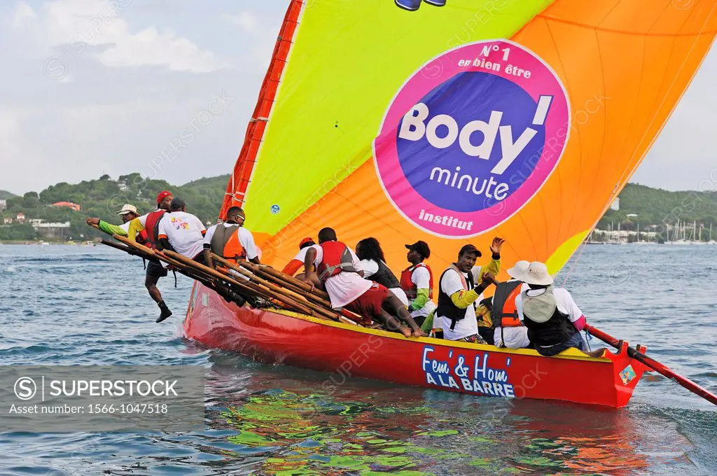 skiff race during the Yoles Festival, Sainte-Anne Bay, Martinique, french island overseas region and department in the Lesser Antilles in the eastern ...