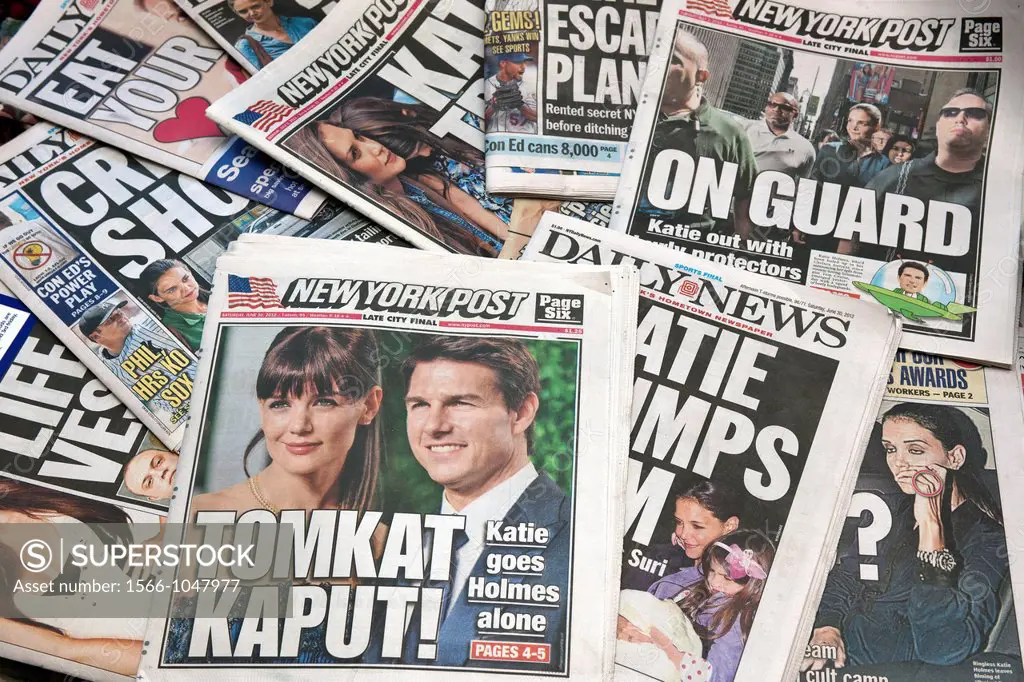 The covers of the New York Daily News and the New York Post over a period of several days in June and July 2012 report on Katie Holmes filing for divo...