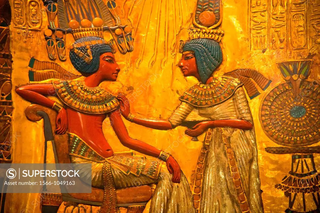 The queen ankhesenamen anointing her husband Tutankhamen beneath the life-giving rays of the sun disc, Chair Discovered in the valley of the kings , E...