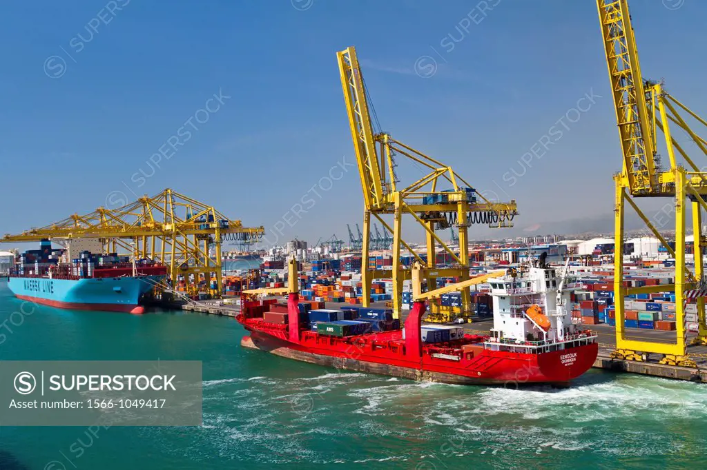 Cargo ships loading and unloading at the port of Barcelona, Spain