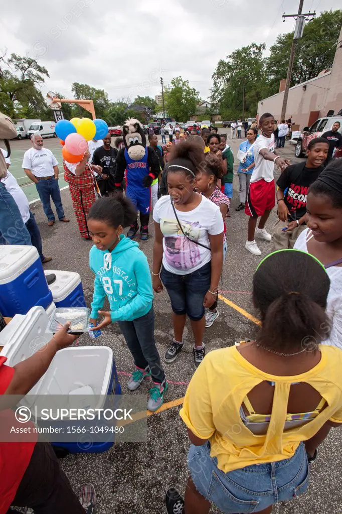 Detroit, Michigan - A Block Party for children at the Boys and Girls Club featured a free lunch, face painting, clowns, and games  It was one of a ser...