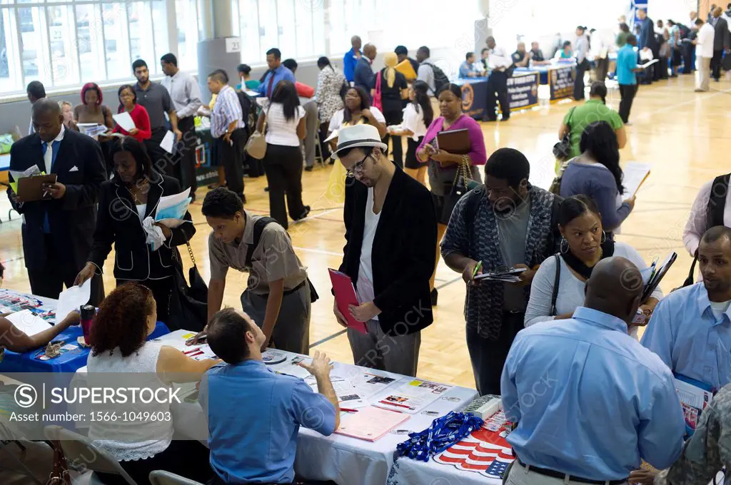 Job seekers attend a job fair in the East Harlem neighborhood of New York The job fair is one of the many events occurring during the Harlem Week fest...