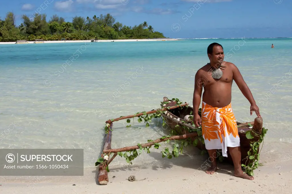Cook islands, New Zealand, Local man in a dugout canoe