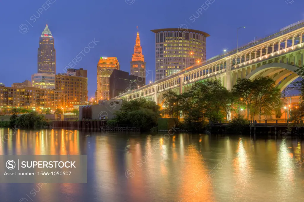 The skyline of Cleveland, Ohio, USA at twilight as viewed over the Cuyahoga River from the Flats.