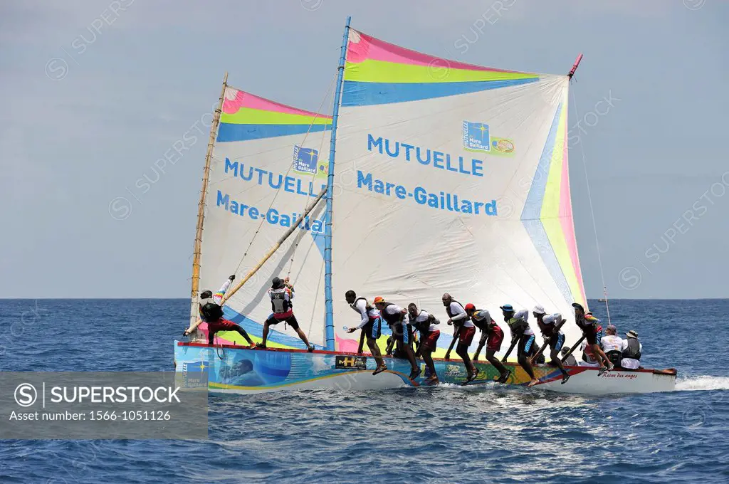 skiff race during the Yoles Festival, Sainte-Anne Bay, Martinique, french island overseas region and department in the Lesser Antilles in the eastern ...