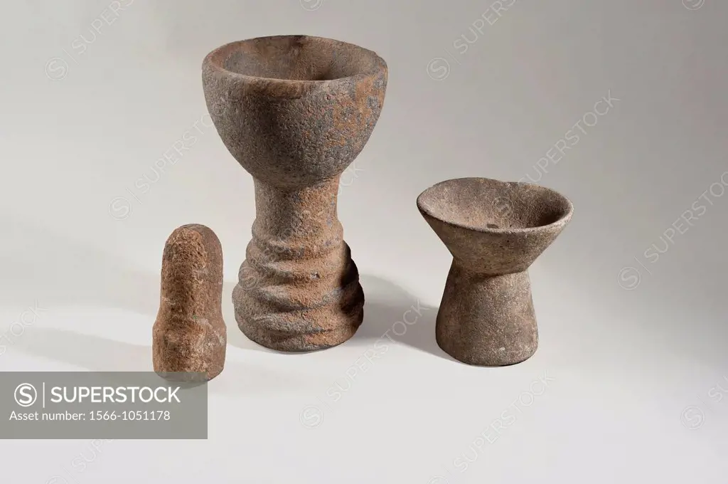 A Chalcolithic Copper age Basalt pedestalled bowl with pestle  4th Millennium BCE