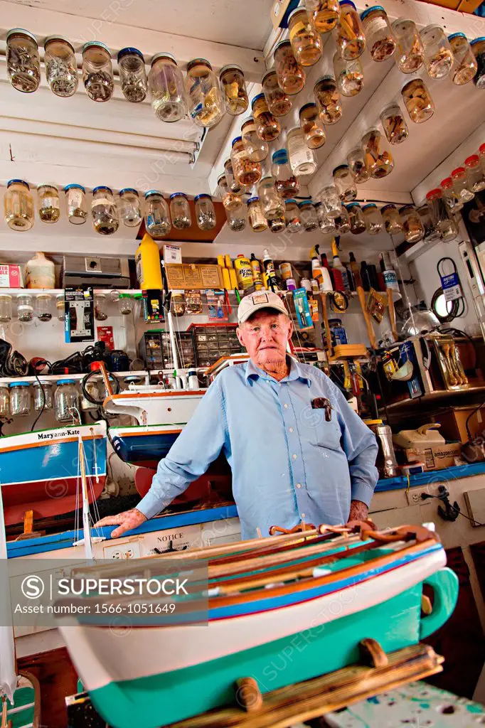 Portrait of Vert Lowe master maker of ship models at his shop on Green Turtle Cay, Bahamas  Master modeler Vert Lowe produces scaled replicas of two-m...