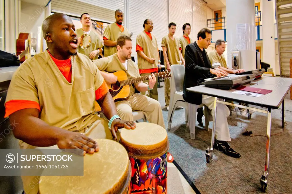 A prison band and choir of male inmates at the Santa Ana, CA city jail sings at graduation of a jail educational program