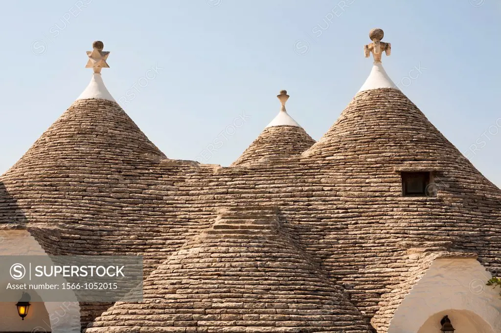 Conical dry stone rooves of trulli houses, Rione Monti, Alberobello, province of Bari, in the Puglia region, Italy