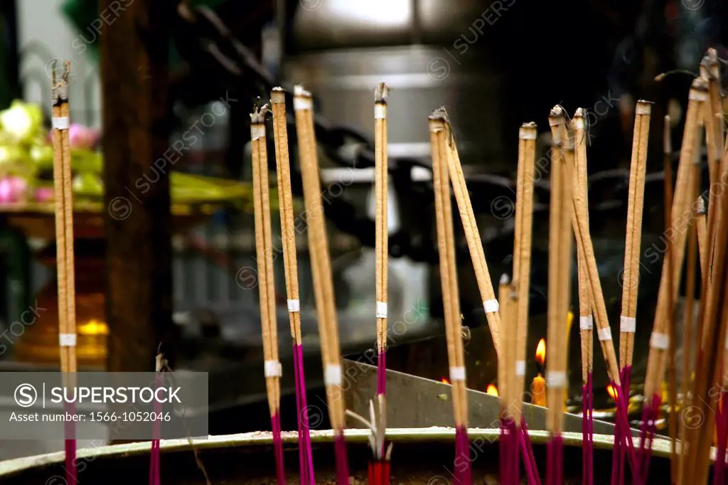 incense sticks burning at Buddhist temple